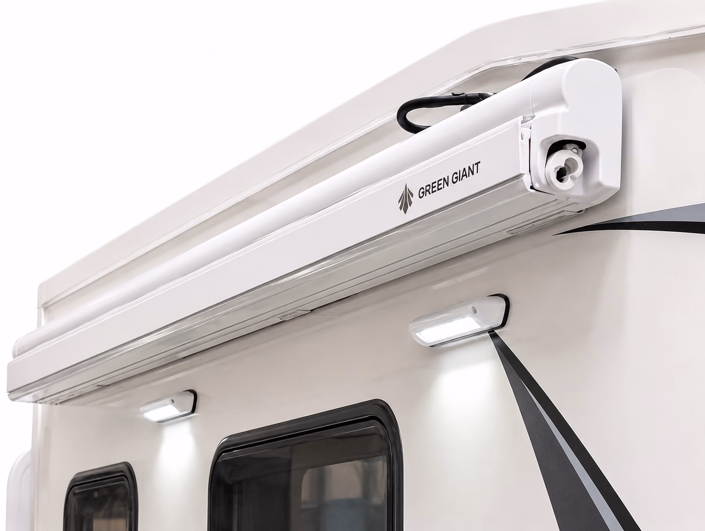Green Giant electric awning mounted on a Kalowen camper