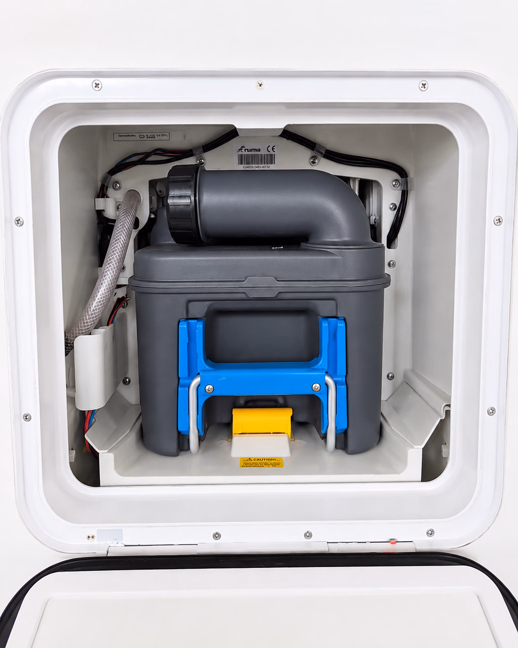 Portable black-water cassette inside an exterior service compartment